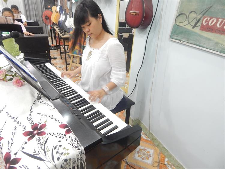 Học piano giỏi